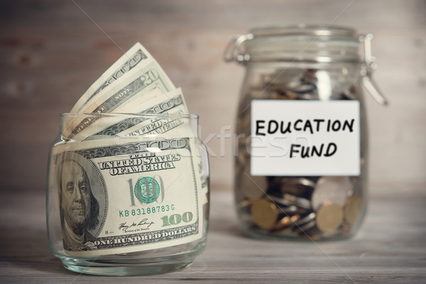 Foto stock: Financeiro · educação · fundo · etiqueta · dólares · moedas