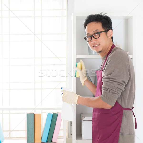 Asian man housekeeping Stock photo © szefei