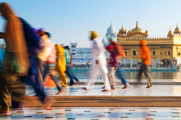 Group of Sikh pilgrims walking by the Golden Temple Stock photo © szefei