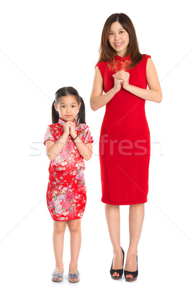 Full body Chinese parent and child greeting to each other Stock photo © szefei