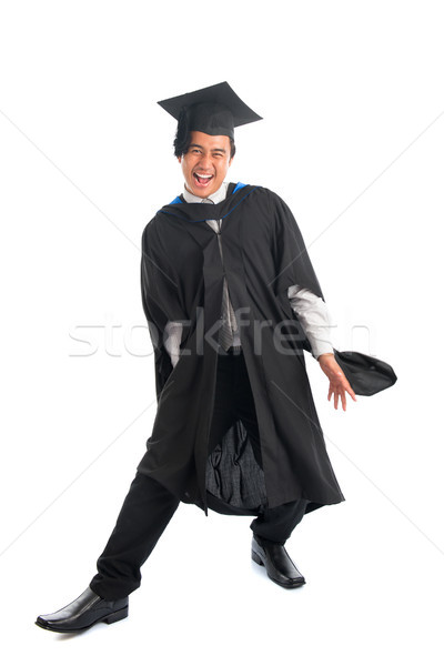 Graduate university student in excitement Stock photo © szefei