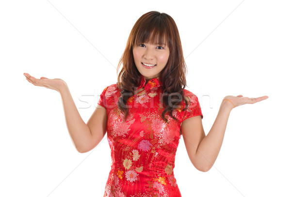 Chinese cheongsam woman showing blank space Stock photo © szefei