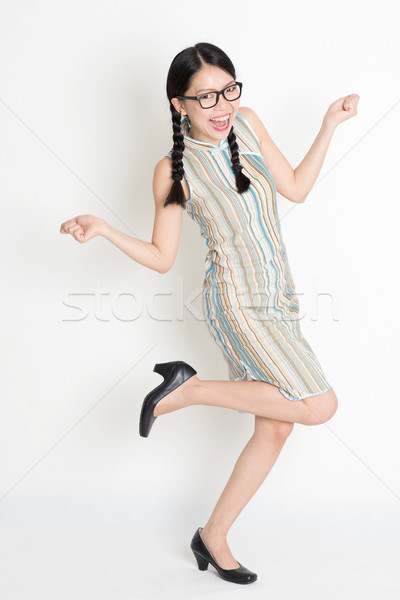 Excited Asian Chinese female hands holding something  Stock photo © szefei