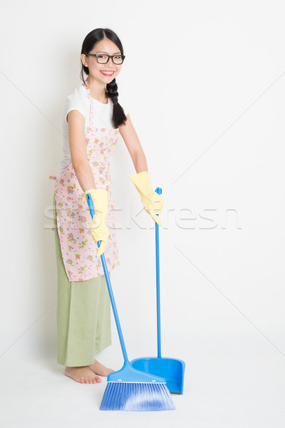 Stock photo: Woman Cleaning floor