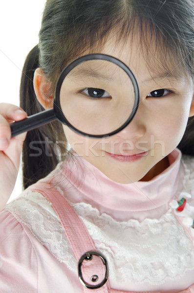 Exploratie meisje camera vergrootglas hand ogen Stockfoto © szefei
