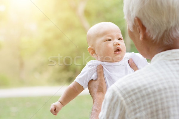 Nagyapa hordoz unoka boldog baba kint Stock fotó © szefei