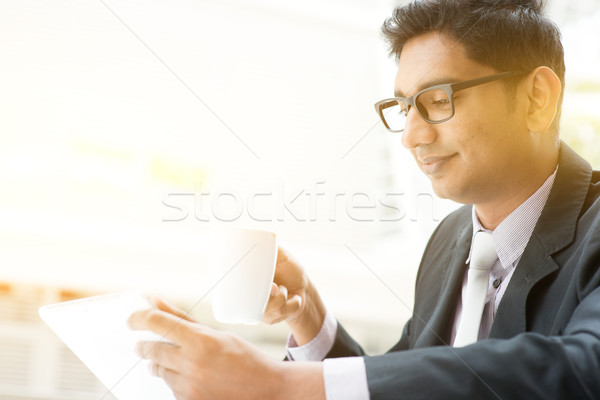 Business people using tablet pc at cafe Stock photo © szefei