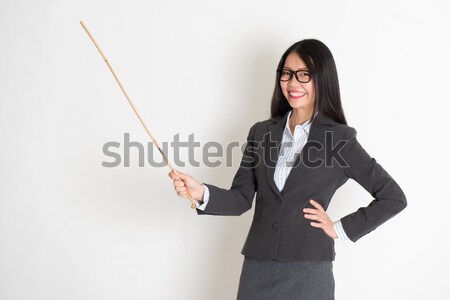 Black business woman using tablet computer Stock photo © szefei