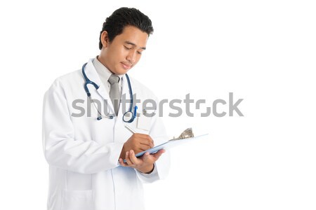 ストックフォト: 医療 · 医師 · 書く · 魅力的な · 小さな · 男性