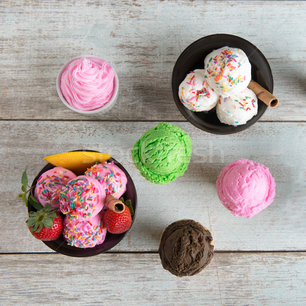 Various color ice cream bowl top view Stock photo © szefei