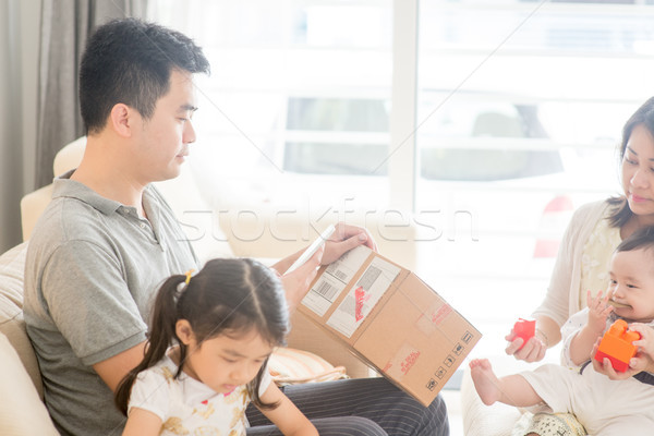 Father scanning QR code  Stock photo © szefei
