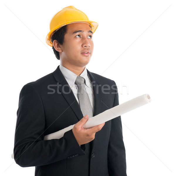 Stock photo: Asian man with safety helmet and blue prints