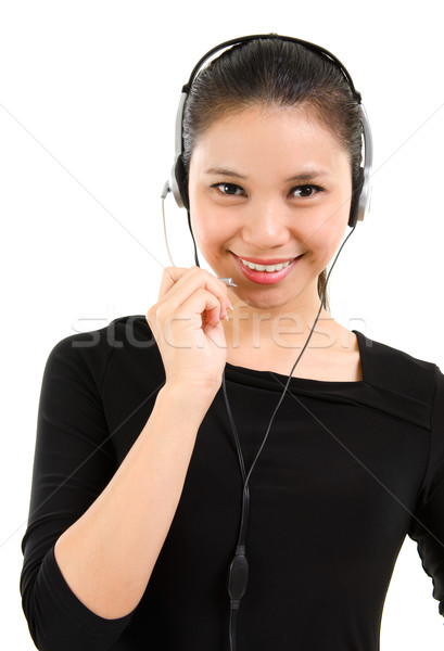 Telemarketing setul cu cască femeie costum negru call center zâmbitor Imagine de stoc © szefei