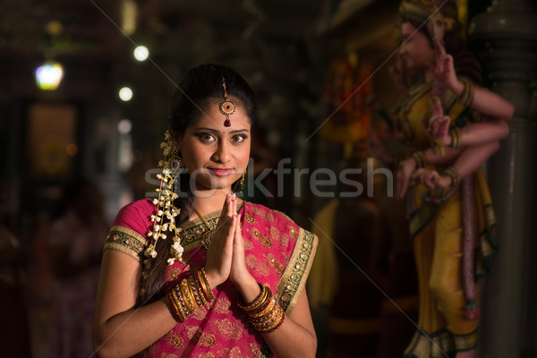 Indian girl praying Stock photo © szefei