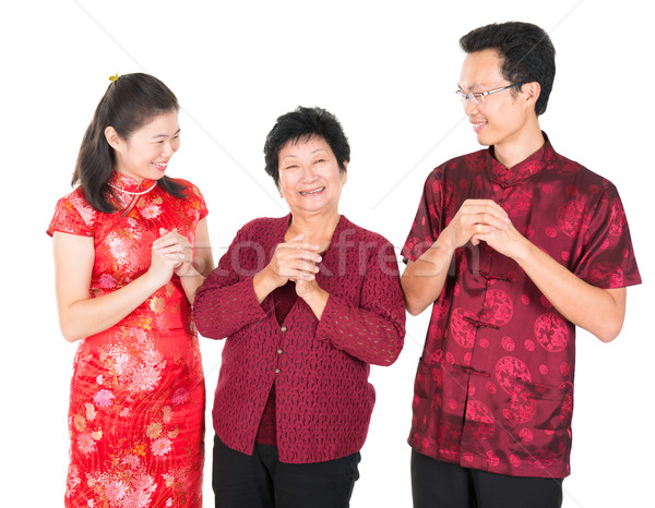 Stock photo: Chinese family greeting 