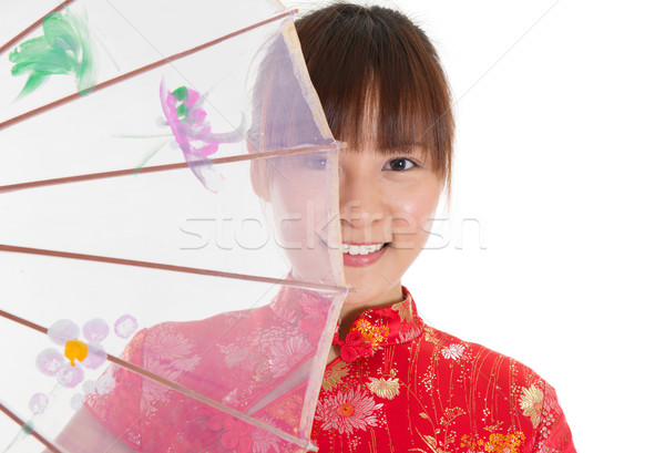 Chinese cheongsam girl with umbrella Stock photo © szefei