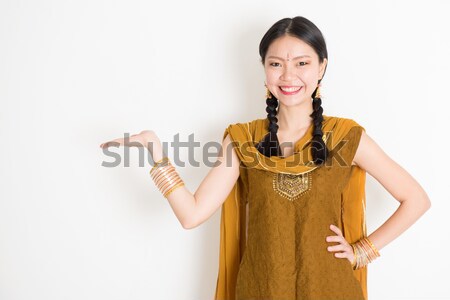 Woman in Punjabi dress greeting. Stock photo © szefei