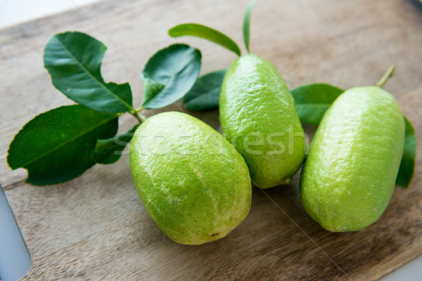 Fresh organic green lemons Stock photo © szefei