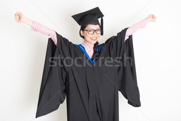 University student arms outstretched  Stock photo © szefei