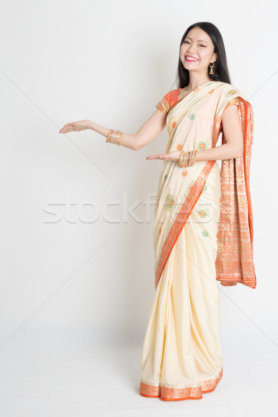 Indian girl hands showing somethings  Stock photo © szefei