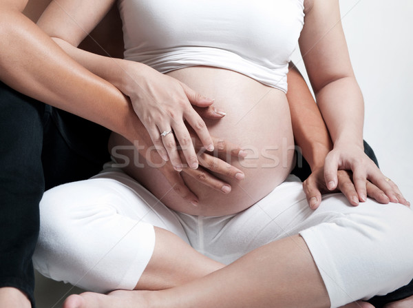 Imagine de stoc: In · primul · rand · copil · femeie · gravida · sotul · şedinţei · podea