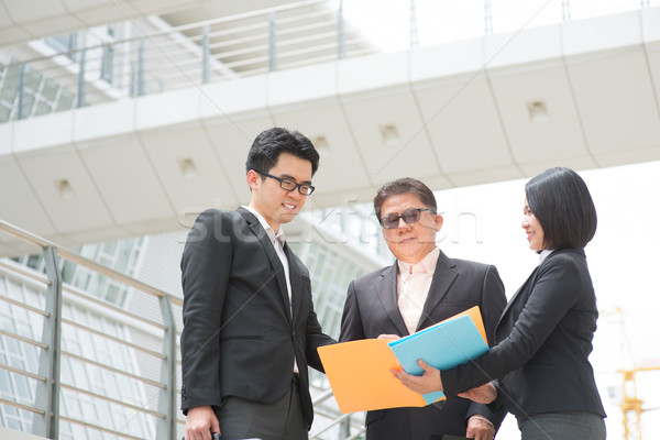 Presenting reports to boss Stock photo © szefei