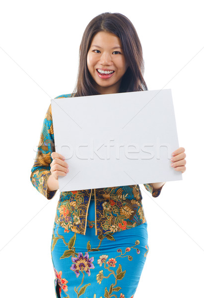 Asian woman holding a white blank card Stock photo © szefei