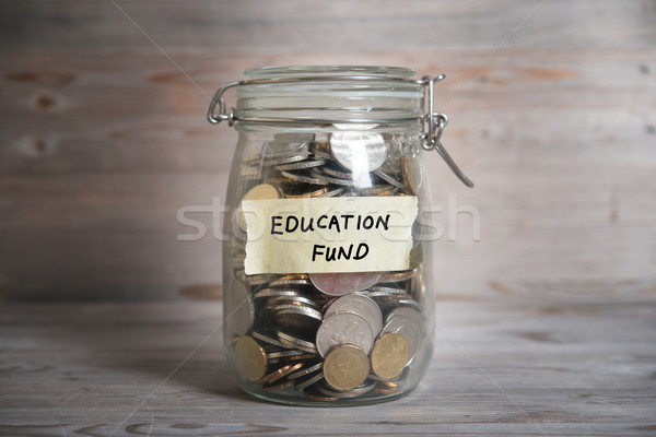 Foto stock: Dinheiro · jarra · educação · fundo · etiqueta · moedas