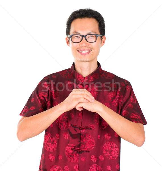 Chinese man greeting Stock photo © szefei