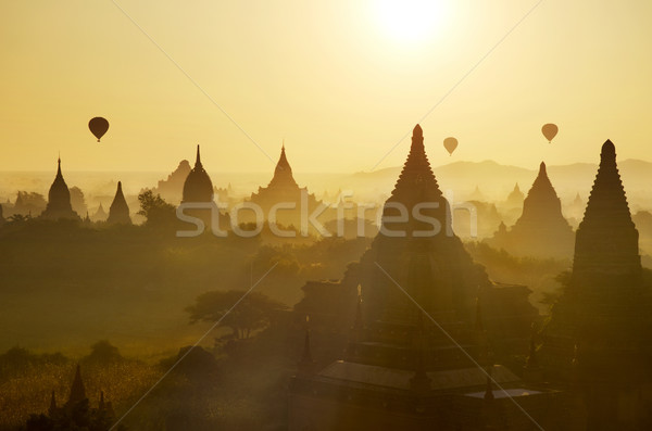 Bagan view with hot air balloons Stock photo © szefei