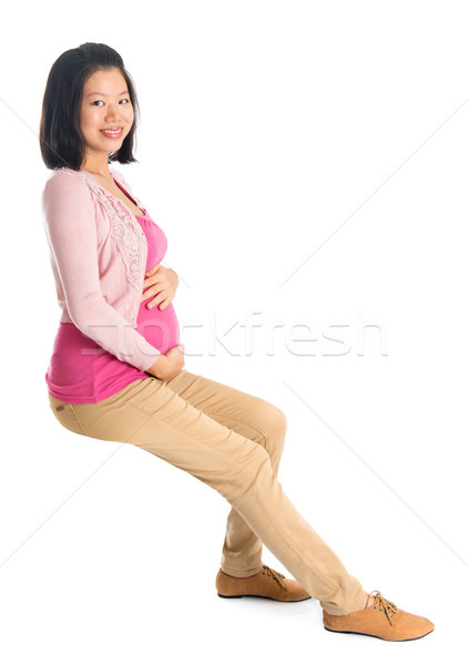 Zwangere asian vrouw vergadering zes Stockfoto © szefei