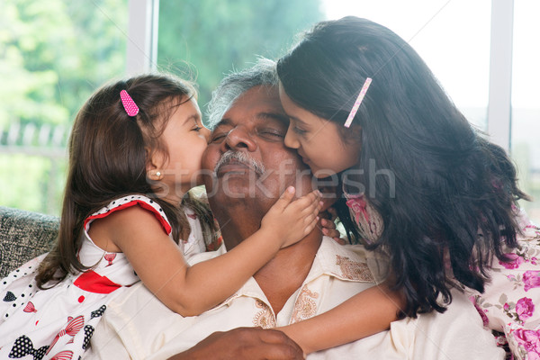 Petits enfants baiser grand-parent portrait indian maison de famille [[stock_photo]] © szefei