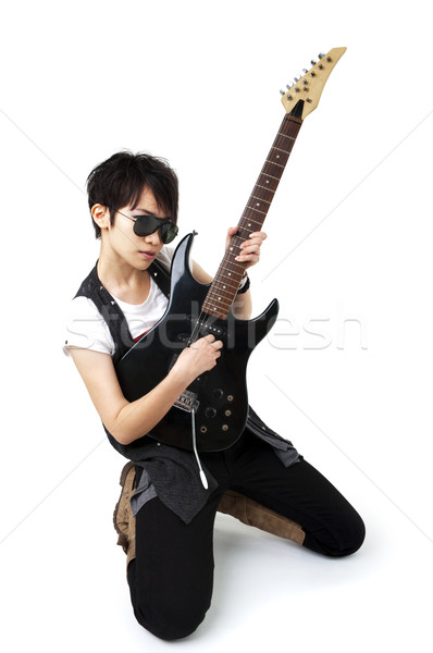 Punk Rockstar holding a guitar Stock photo © szefei