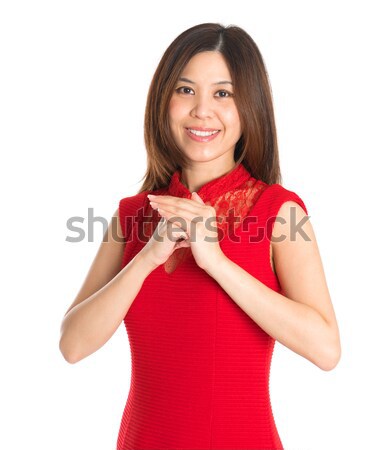 Asian woman respecting on Chinese New Year Festival. Stock photo © szefei