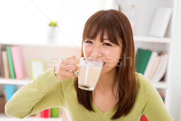 Drinking soy milk Stock photo © szefei