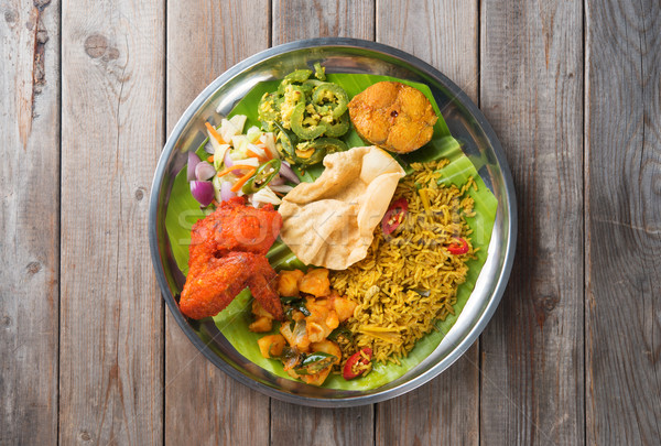 Biryani rice on dining table Stock photo © szefei