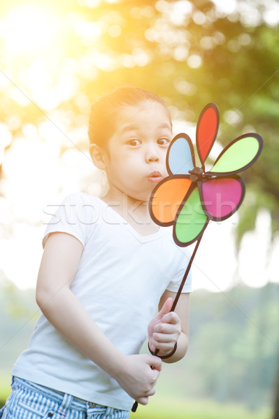 Asya çocuk fırıldak açık havada portre Stok fotoğraf © szefei