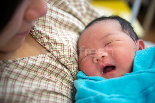 Asian mother and newborn baby Stock photo © szefei