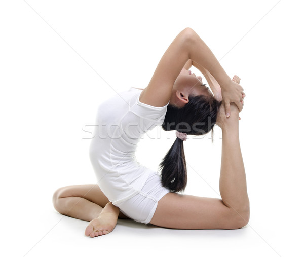Yoga mujer paloma plantean aislado blanco Foto stock © szefei