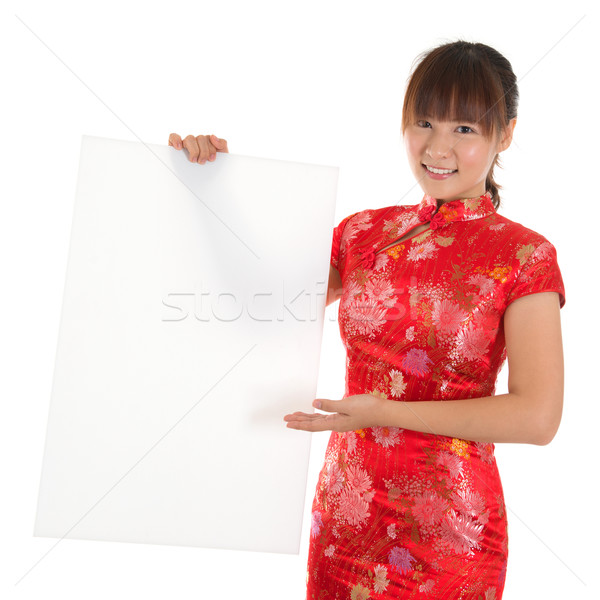Chinese cheongsam girl holding white blank card Stock photo © szefei