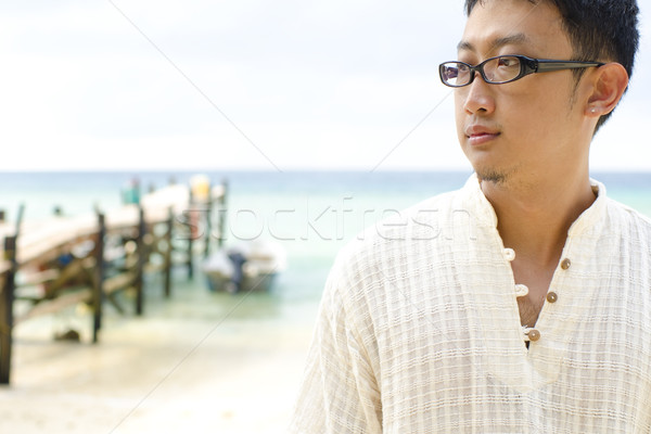 ázsiai férfi fiatalember jó idő pihen Stock fotó © szefei