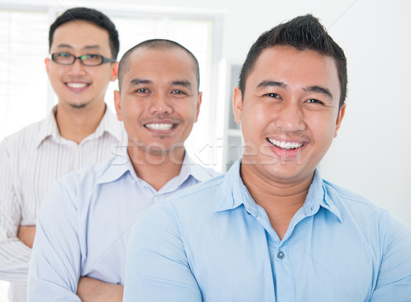 Sudeste asiático em pé escritório feliz Foto stock © szefei