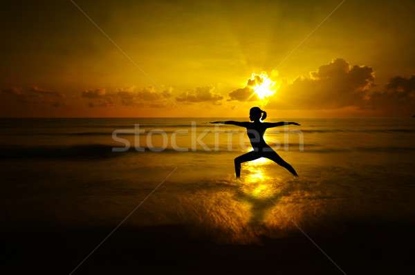 Outdoor beach yoga silhouette Stock photo © szefei