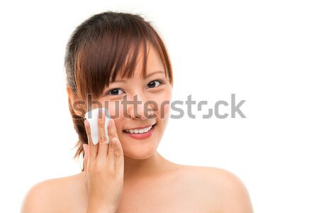 Cura della pelle donna crema per il viso toccare guancia bellezza Foto d'archivio © szefei
