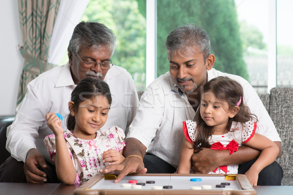 Multi generations family playing games Stock photo © szefei