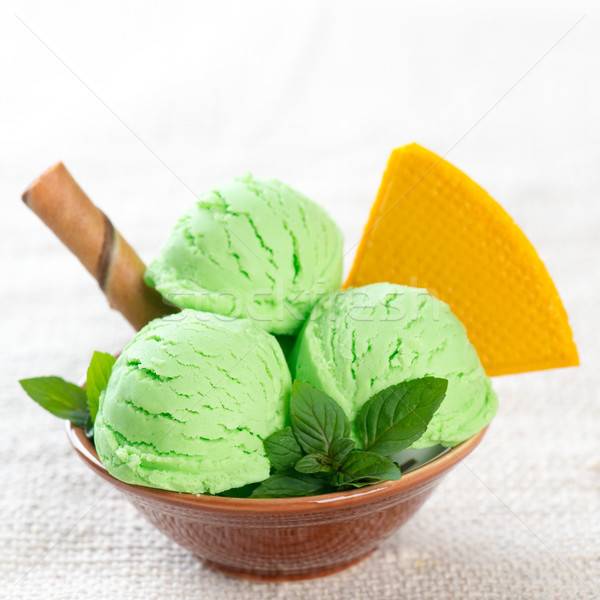 Pistachio ice cream bowl Stock photo © szefei