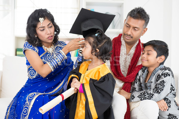 Kindergarten graduation with family Stock photo © szefei