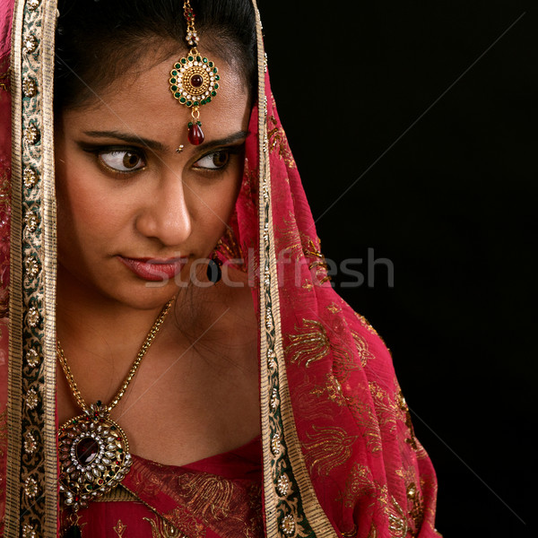 Indian girl looking at side space Stock photo © szefei