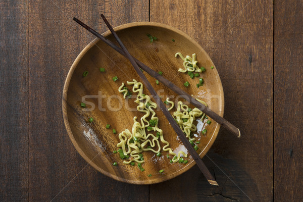Leftover noodles on dining table Stock photo © szefei
