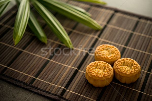 Moon cakes on bamboo mat Stock photo © szefei